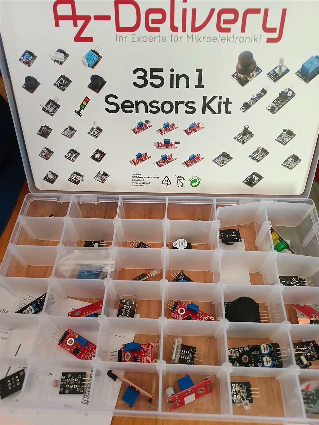 An open AZ-Delivery 35 in 1 sensor kit box full of sensor modules